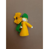 Seasonal doll daffodil  with flowers in her hand