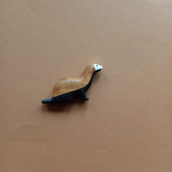 Wooden ferret sitting