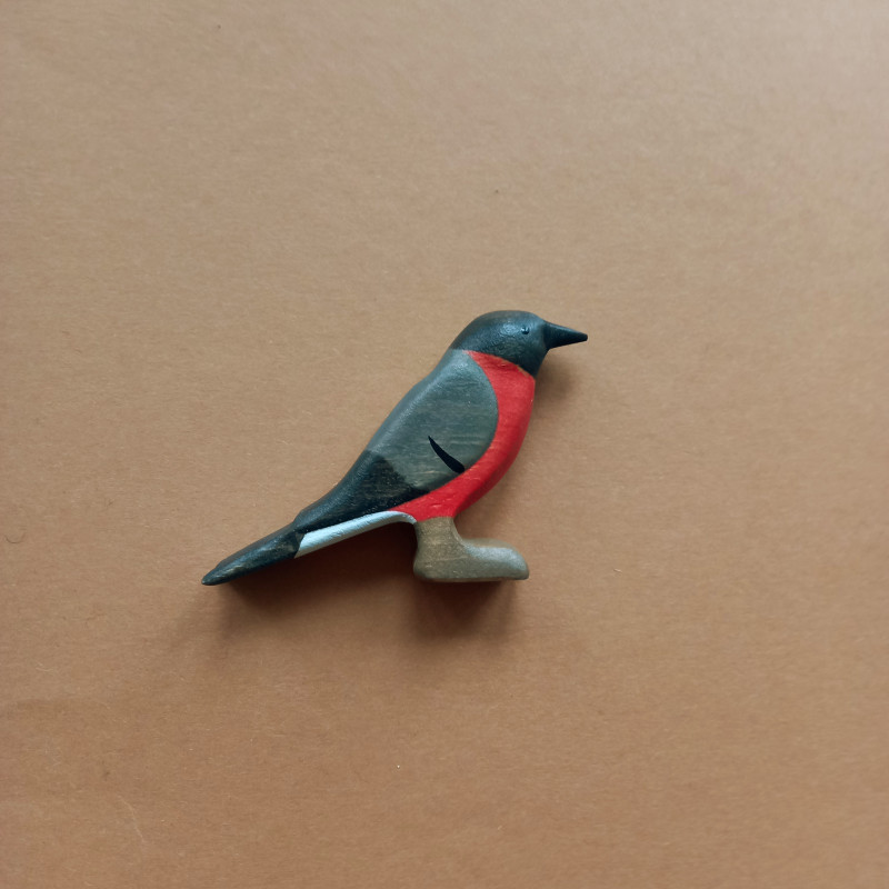 Wooden bullfinch bird