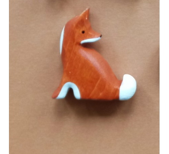 Forest melody  wooden sitting fox looking back