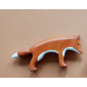 wooden sniffing fox