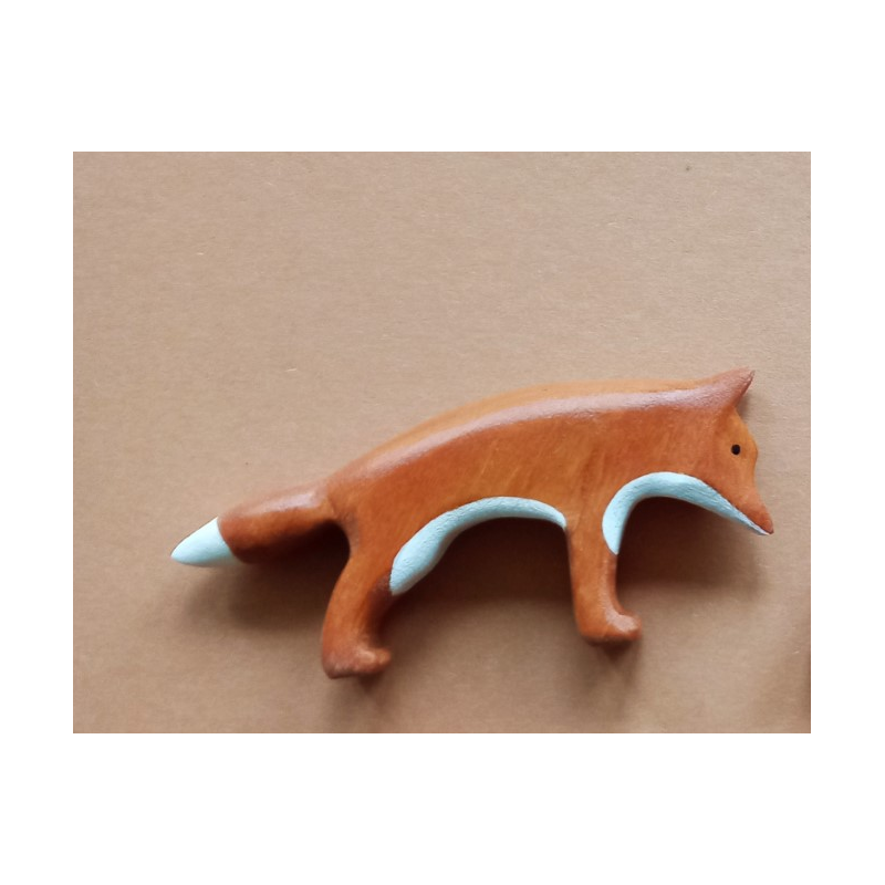 wooden sniffing fox