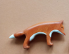 wooden sniffing fox