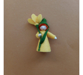 Seasonal doll yellow Crocus with flowers in her hand