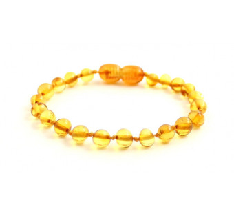 Amber bracelet joney coloured polished