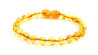 Amber bracelet joney coloured polished