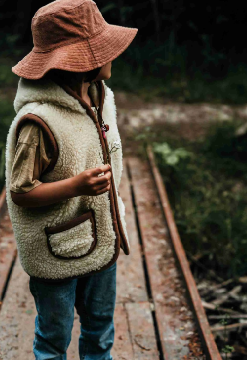 We are wovens woolen bodywarmer flate white (child)