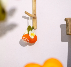 Sjaal met verhaal hanger sinaasappel